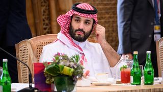 Saudi Arabian Crown Prince Mohammed bin Salman sits in his seat at the G20 Summit held in Nusa Dua, Indonesia on November 15, 2022.